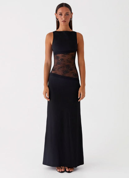 Black sleeveless maxi dress with sheer lace cutout at waist