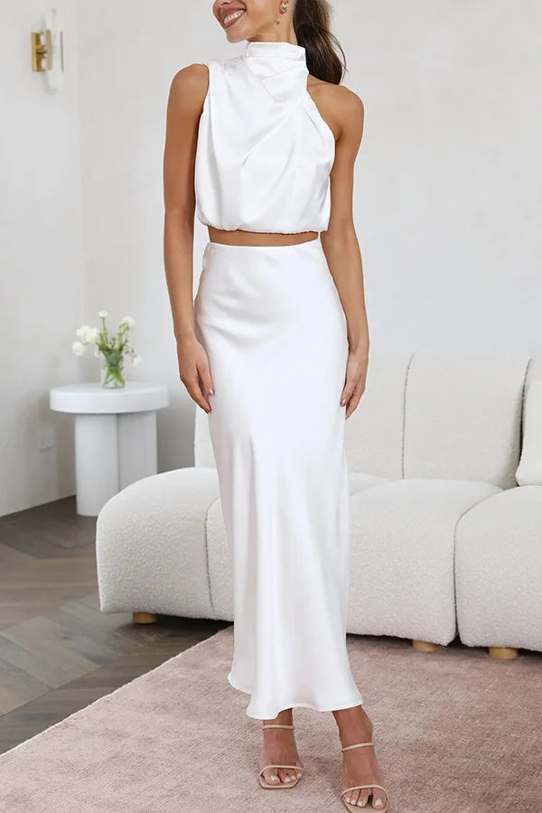 White satin draped halter crop top and maxi skirt set