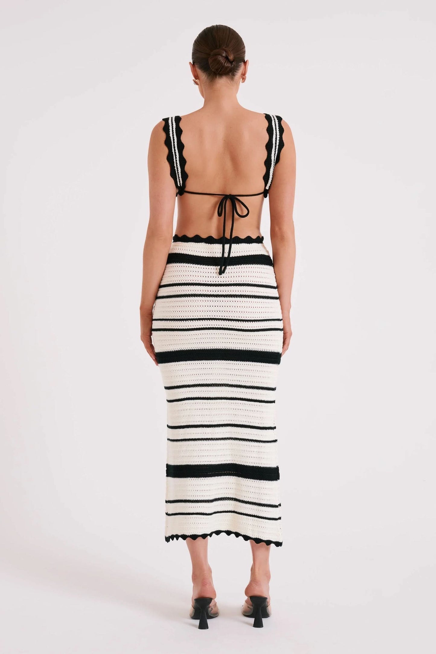 Back view of striped midi set showing tie-back bikini top and scalloped edges