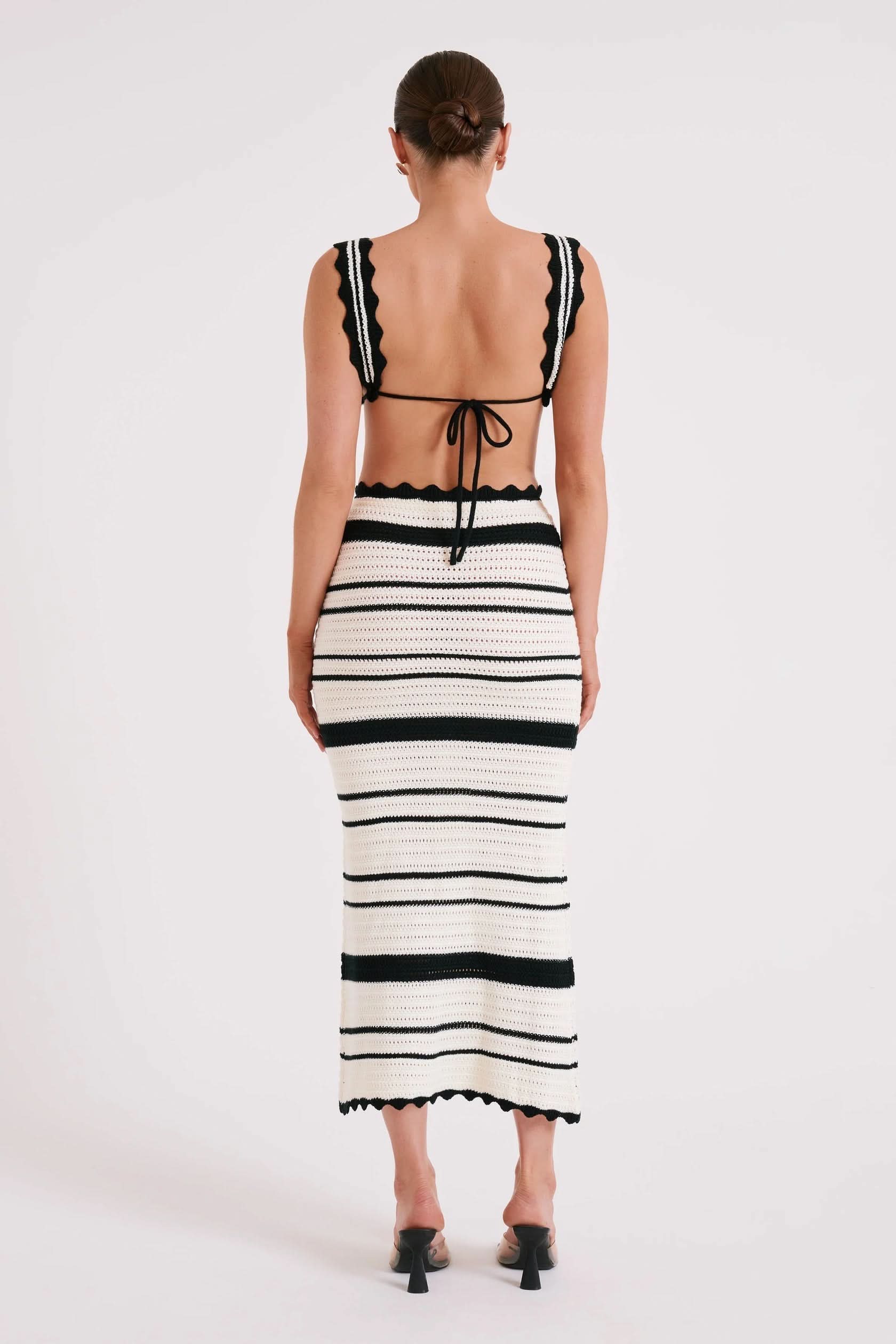 Back view of striped midi set showing tie-back bikini top and scalloped edges