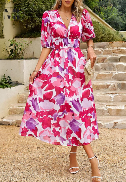 Fuchsia and purple floral midi dress with puffed sleeves and v-neckline