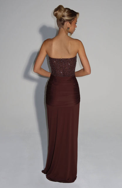 Back view of burgundy sequin maxi dress with open back