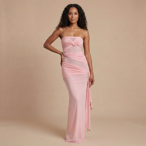 Blush pink strapless ruched maxi dress with asymmetrical side drape for women