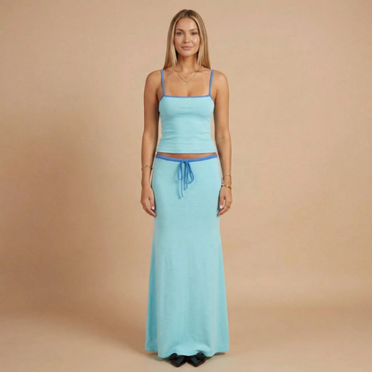Light blue spaghetti strap crop top and flowing maxi skirt matching set for women