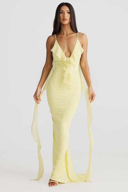 Pale yellow wrap maxi dress with ruffled V-neckline and tie waist detail