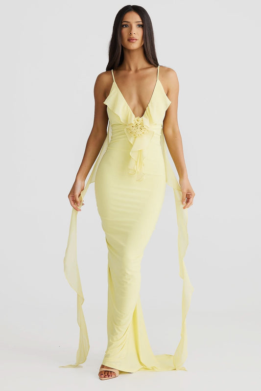 Pale yellow wrap maxi dress with ruffled V-neckline and tie waist detail