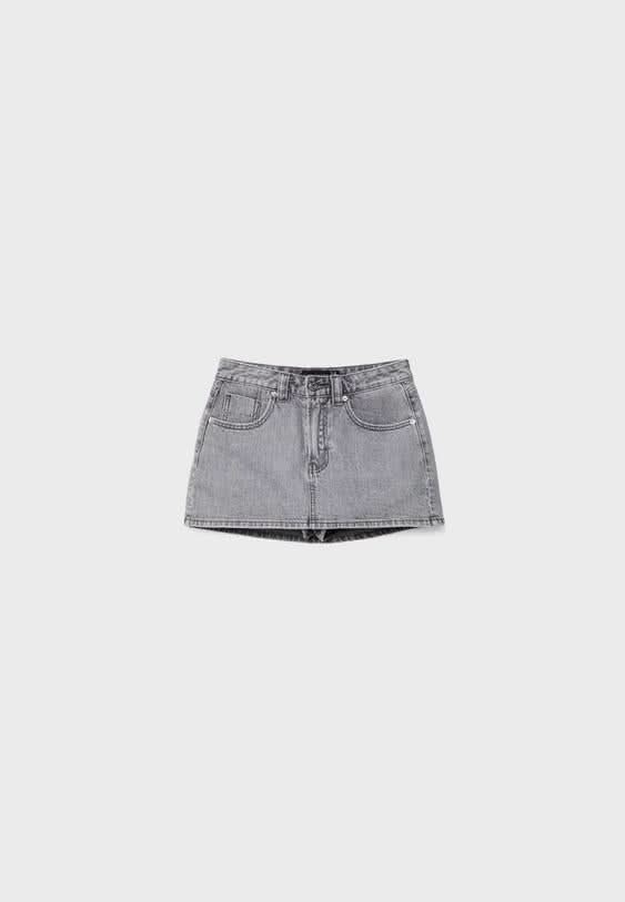Gray denim mini skort flat lay showing overall silhouette and construction