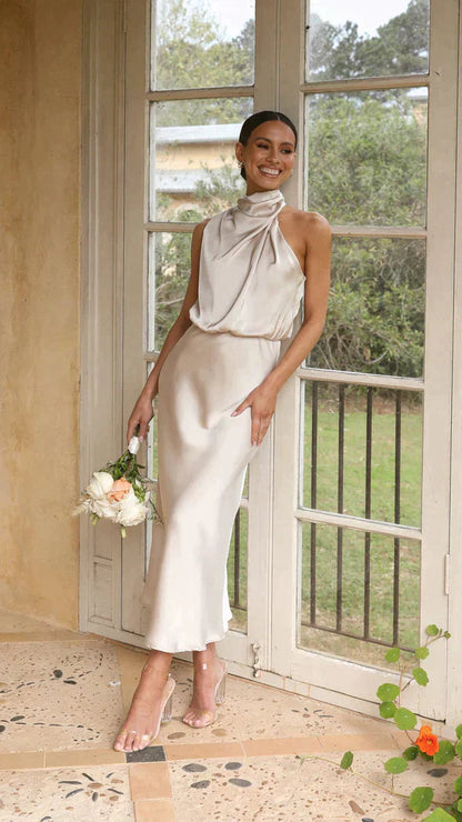 Cream draped halter midi dress with flowing neckline detail