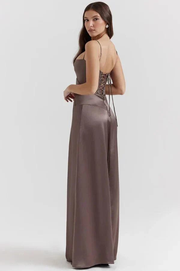 Back view of taupe corset maxi dress with lace-up corset closure