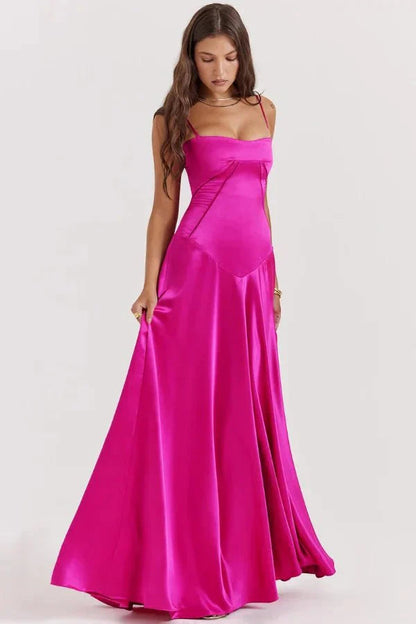 Magenta corset maxi dress with off-shoulder straps and floor-length skirt