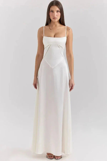 Cream corset maxi dress front view with structured sweetheart neckline