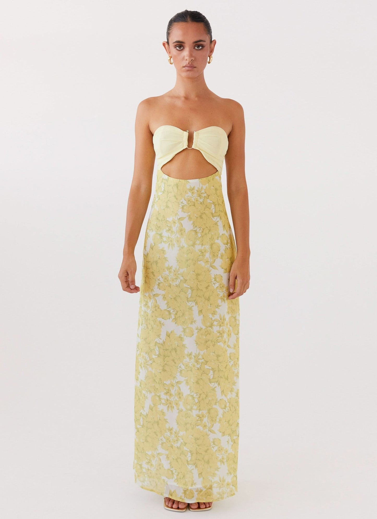 Strapless yellow floral maxi dress with front cutout detail