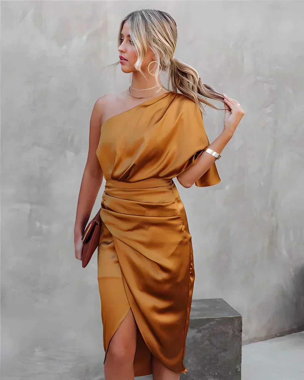 Gold one-shoulder draped midi dress with ruched details and thigh slit