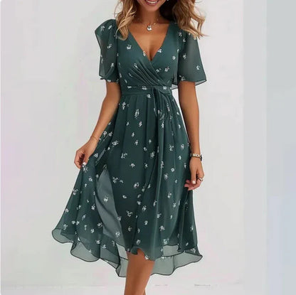 Forest green wrap midi dress with small white leaf pattern and tie waist