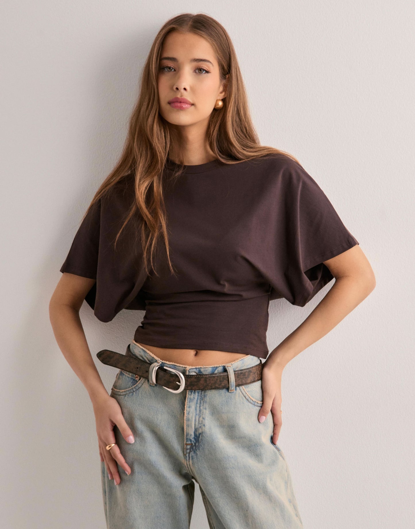 Soft pink batwing crop top with short flutter sleeves, front view