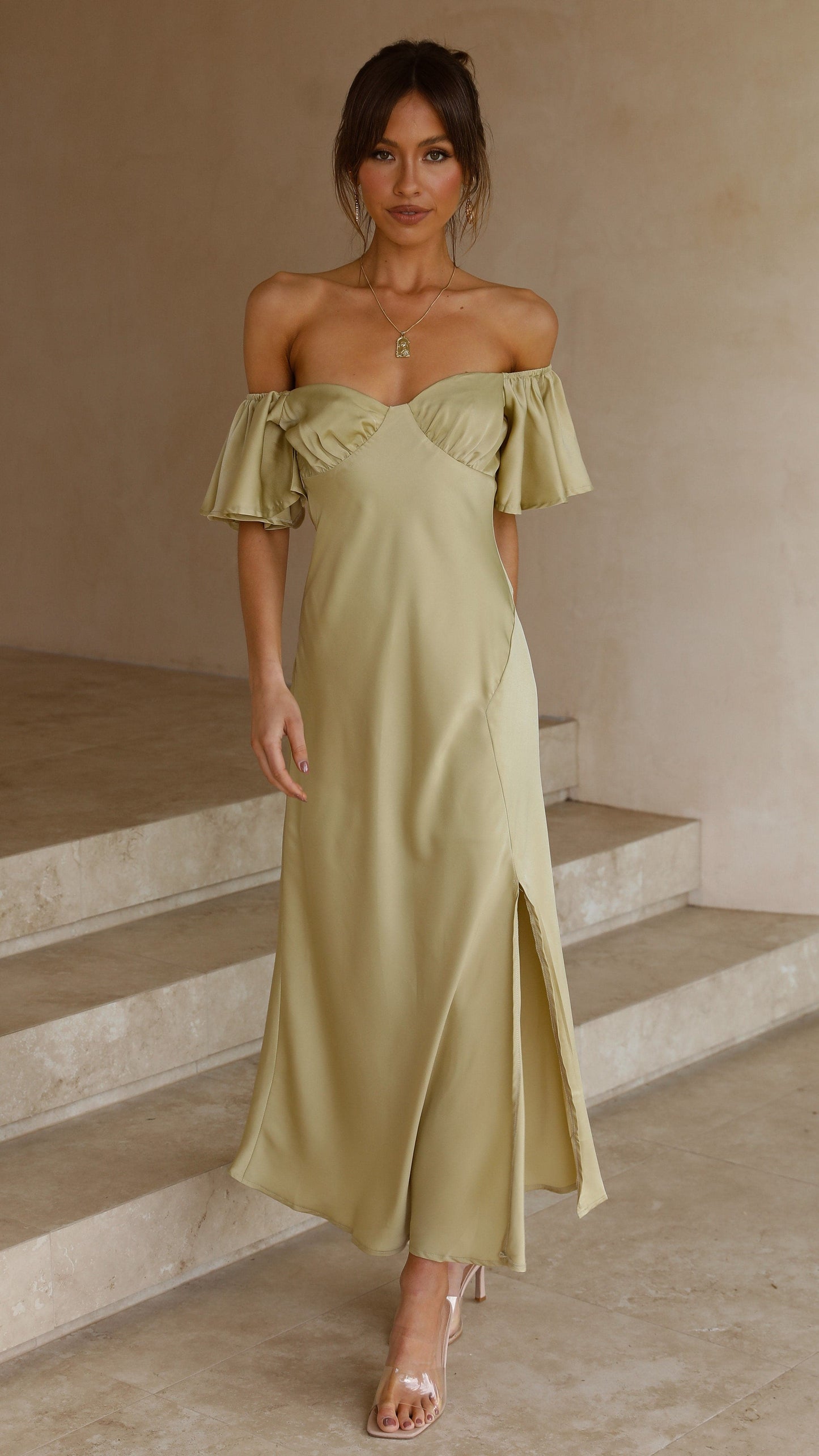 Pale yellow ruffle midi dress with flutter sleeves and wrapped off-shoulder neckline