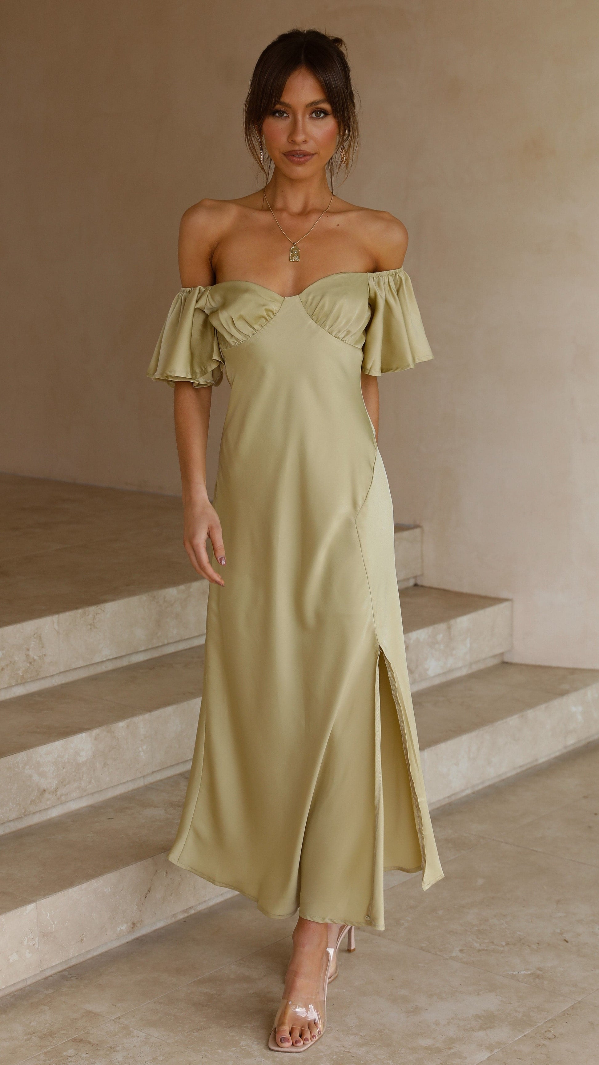 Pale yellow ruffle midi dress with flutter sleeves and wrapped off-shoulder neckline