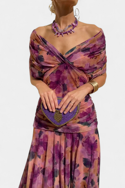 Purple floral ruched maxi dress with off-shoulder wrap neckline and draped sleeves