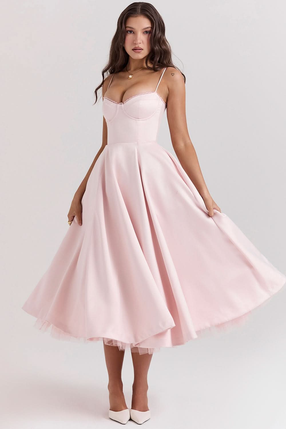 Pale pink corset midi dress with spaghetti straps and full tulle skirt