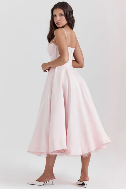 Blush pink corset midi dress back view with spaghetti straps and tulle