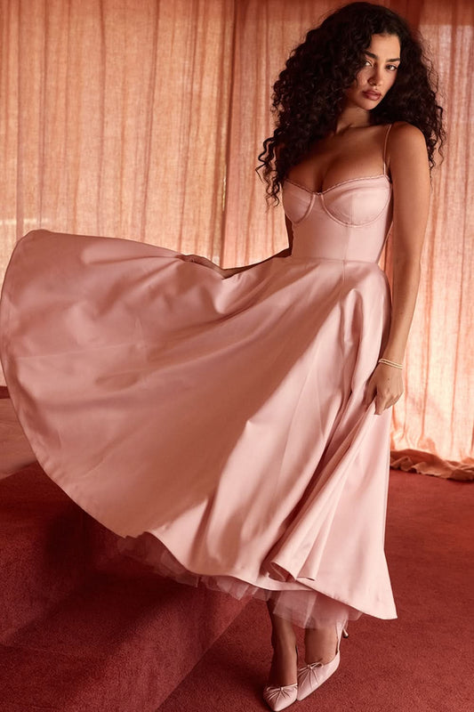 Blush pink corset midi dress with sweetheart neckline and flowing skirt