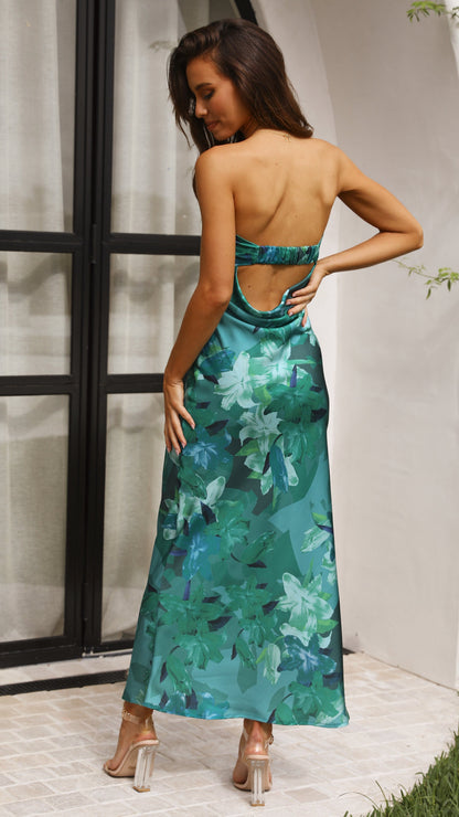 Back view showing cutout details on green floral maxi dress