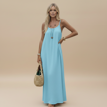 Light blue sleeveless maxi dress with gathered neckline and relaxed fit silhouette