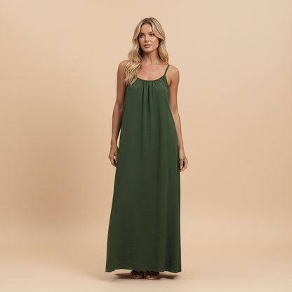 Forest green ruched maxi dress with thin straps and gathered neckline