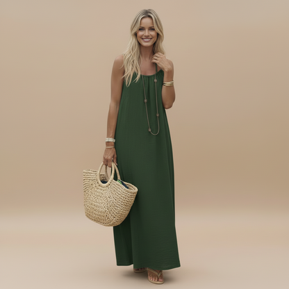 Sage green sleeveless maxi dress with ruched bodice and long hem