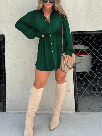 Forest green button-front mini romper with long sleeves and cinched waist