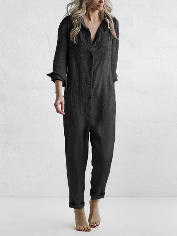 Charcoal gray linen pocket jumpsuit with button front and rolled cuffs