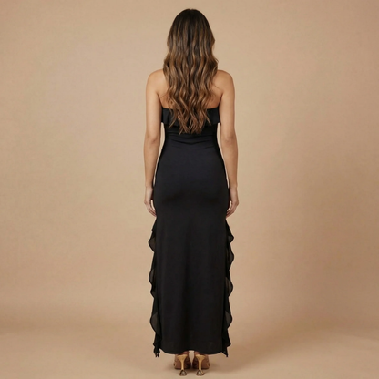 Black strapless ruffle maxi dress back view showing cascading ruffles and clean neckline