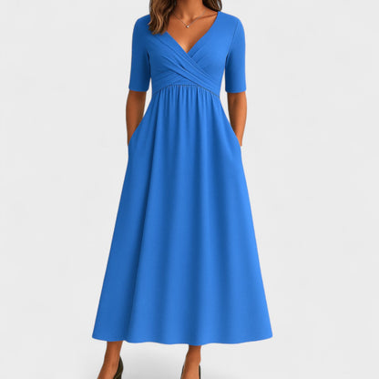 Bright blue wrap midi dress with crossover bodice and pockets