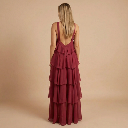 Back view of burgundy ruffle maxi dress with low open back