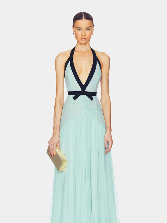 Mint green halter maxi dress with deep V-neckline and black trim