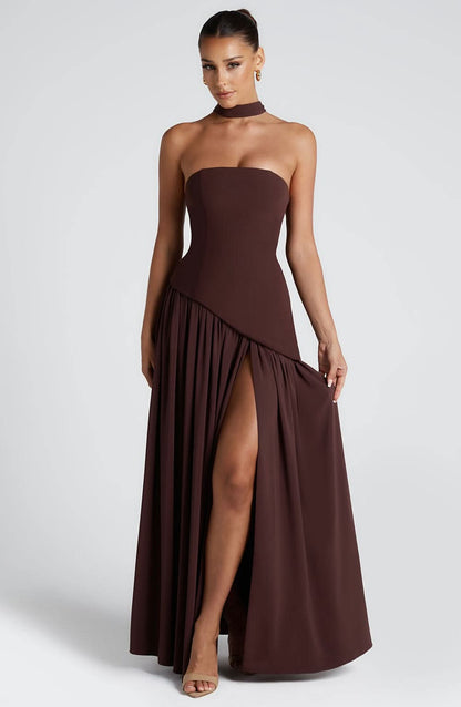 Brown wrap maxi dress with strapless bodice and asymmetrical draped skirt