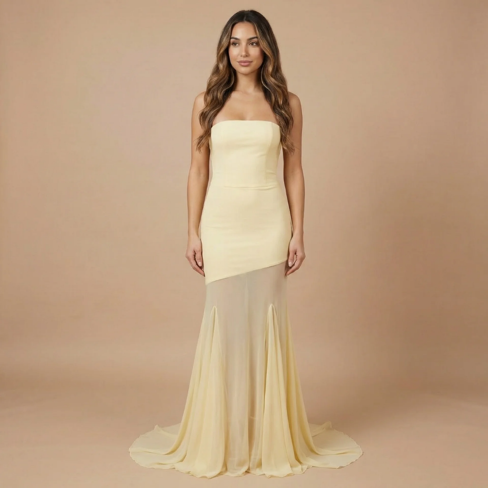 Cream strapless maxi dress with fitted bodice and flowing mesh skirt