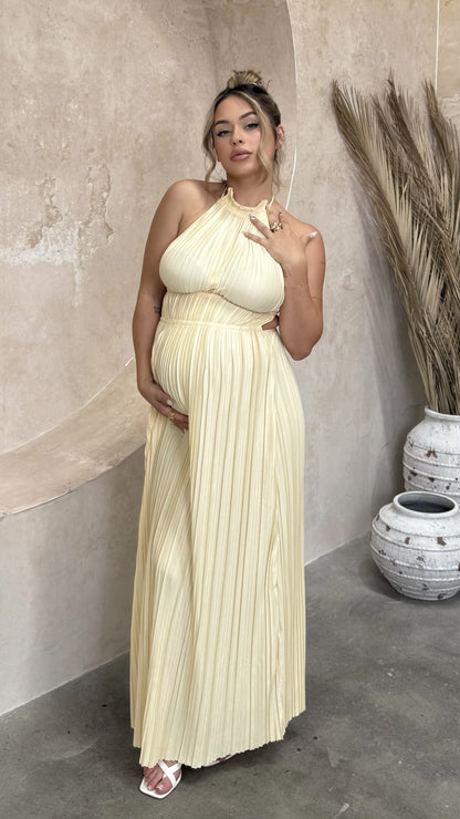 Cream pleated maxi dress with halter neckline and gathered bodice detail