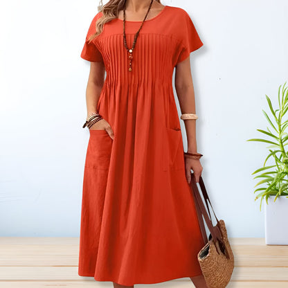 Rust orange maxi dress with pleated yoke detail and short sleeves for women