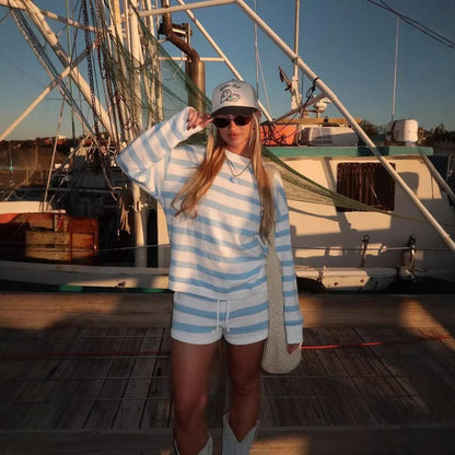 Blue and white horizontal striped knit sweater and shorts ensemble