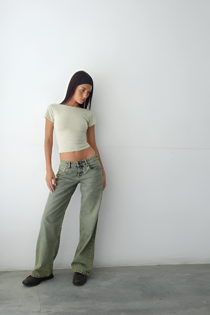 Sage green wide leg jeans with relaxed fit and vintage-inspired wash