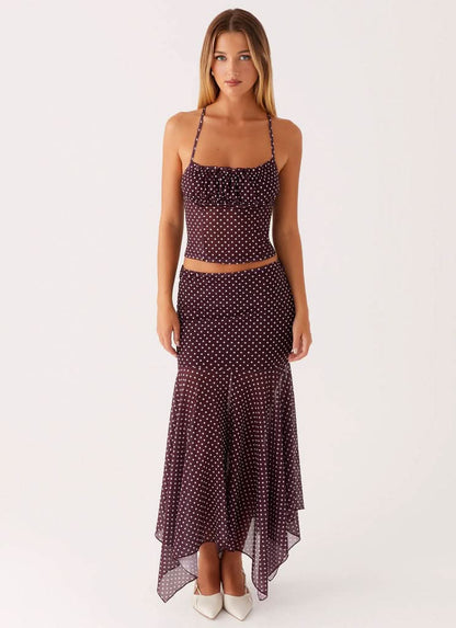 Burgundy polka dot ruched crop top and asymmetrical midi skirt set