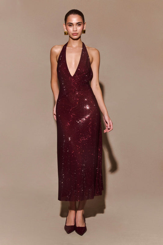 Burgundy sequin halter midi dress with deep V-neckline and open back