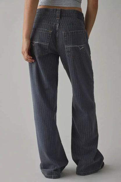 Back view of dark indigo wide-leg jeans showing full-length hem and pinstripe pattern