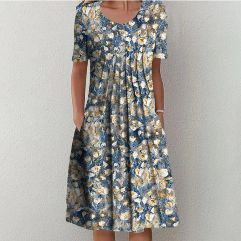 Navy and gold floral midi dress with relaxed fit and scoop neckline for women