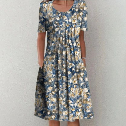 Navy and gold floral midi dress with relaxed fit and scoop neckline for women