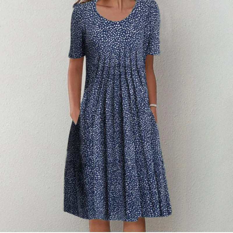 Navy dotted midi dress with pleated front and short sleeves for women