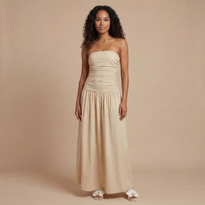 Cream strapless ruched maxi dress with flowing skirt