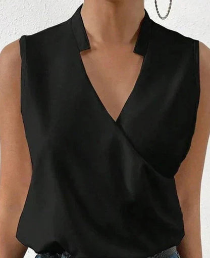 Black wrap notch collar sleeveless top with structured shoulders
