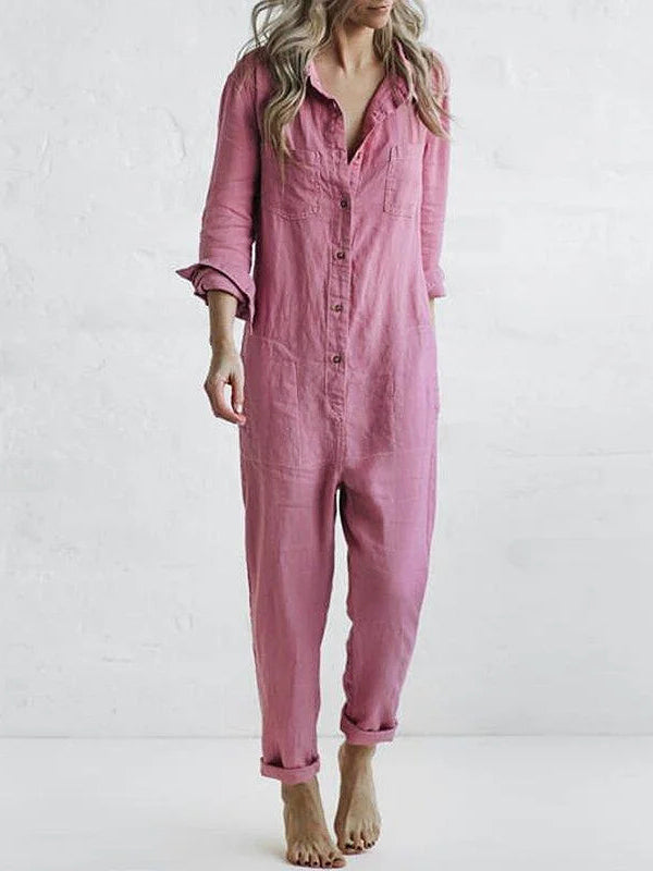Side view of mauve pink linen jumpsuit showing button placket and sleeve detail